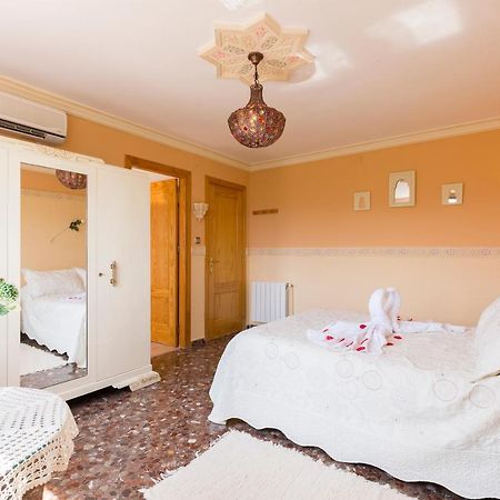 Habitaciones Iraizas Con Piscina Otura ภายนอก รูปภาพ