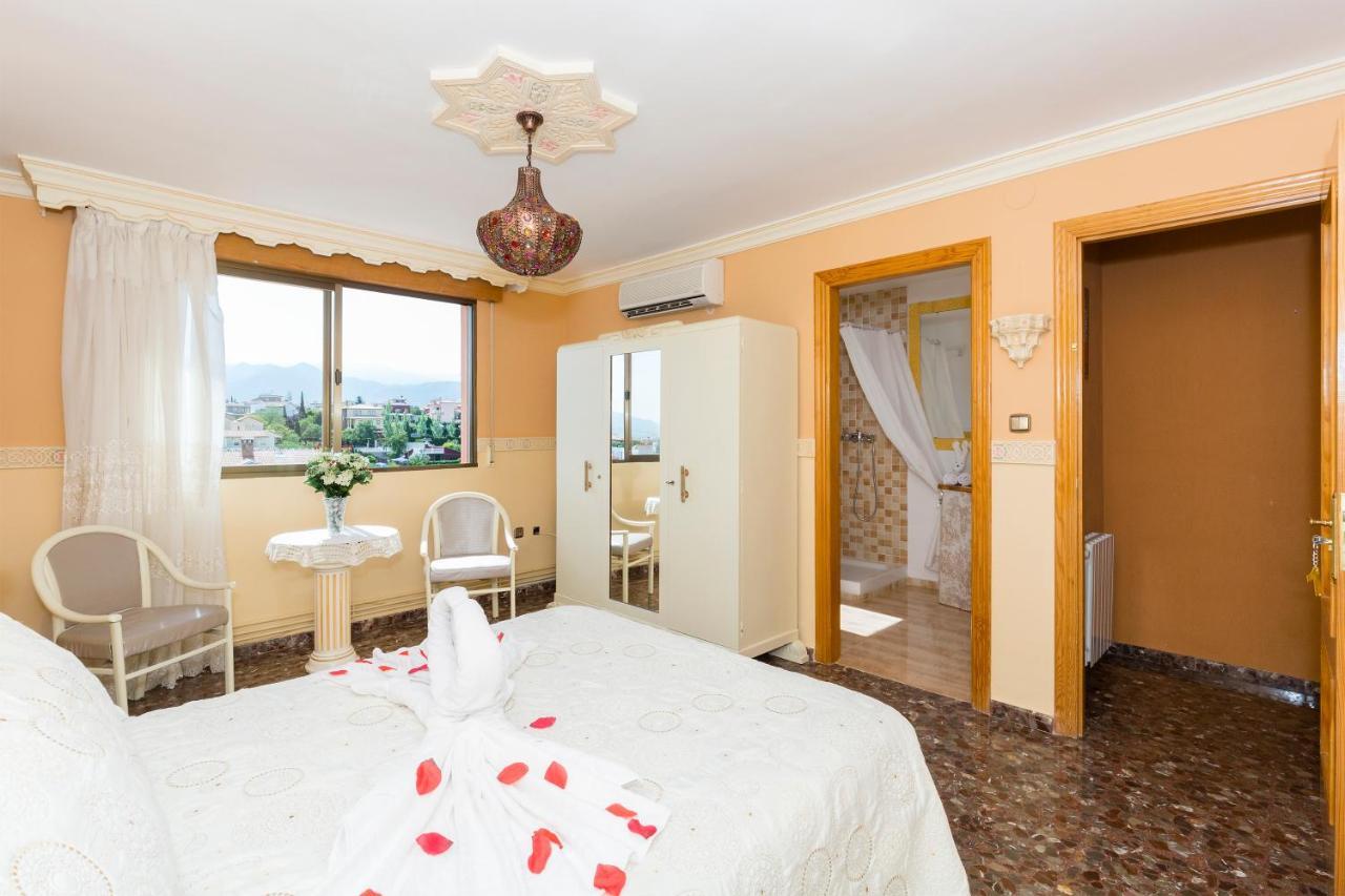 Habitaciones Iraizas Con Piscina Otura ภายนอก รูปภาพ